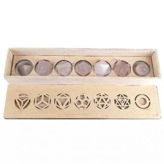 Juego de Siete Poliedros de Cuarzo Rosa en caja de Madera